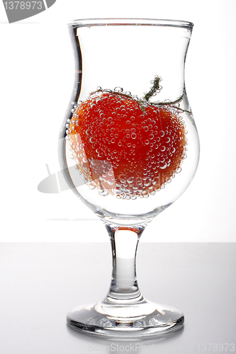 Image of tomato in glass