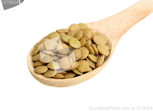 Image of lentils in wooden spoon