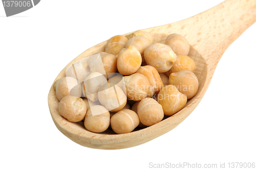 Image of peas in a wooden spoon