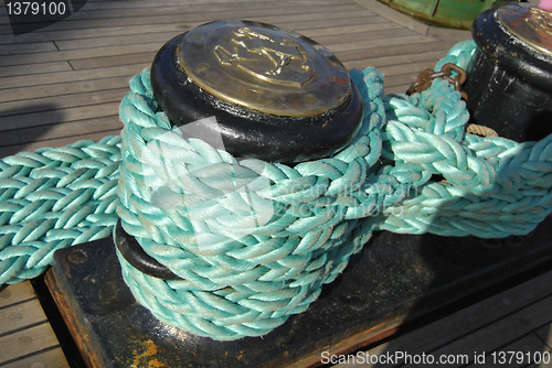 Image of Green Rope Rolled On Bollard