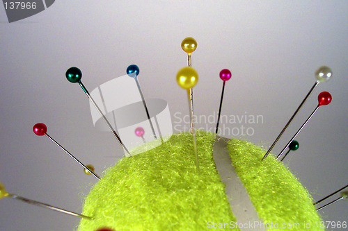 Image of colorful needles on a ball