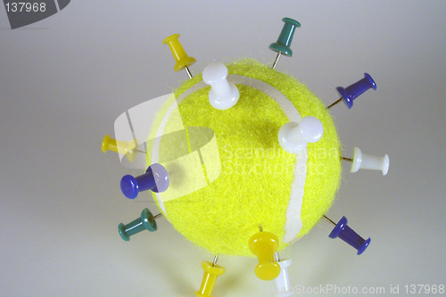 Image of push pins on ball