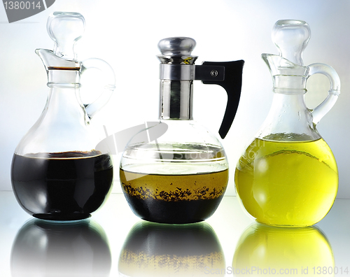 Image of oil , vinegar and salad dressing 