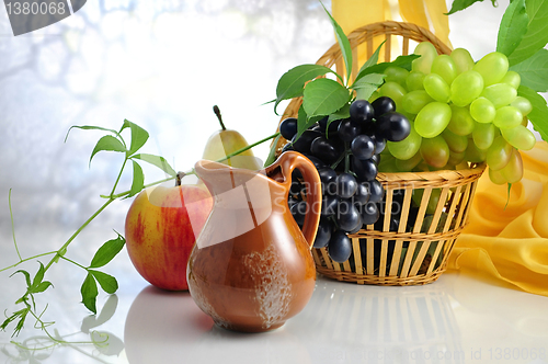 Image of fruits and pitcher