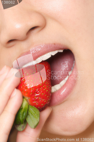 Image of Woman and strawberry