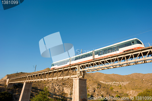Image of Train crossing a bridge