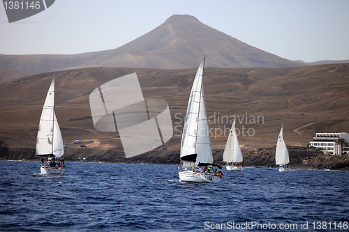 Image of LANZAROTE, SPAIN - OCTOBER 11: three fully crewed yachts out sai