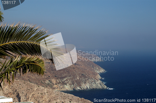 Image of trees over island cliffs