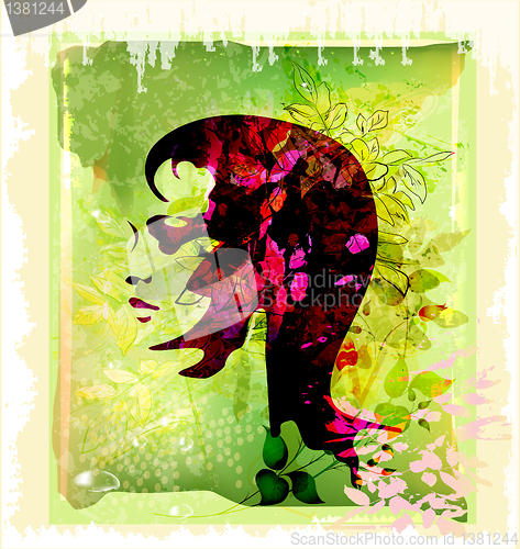 Image of silhouette  of beautiful young woman on the floral background