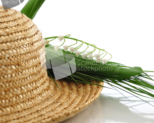 Image of straw hat and flowers