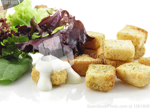 Image of  croutons and salad leaves 