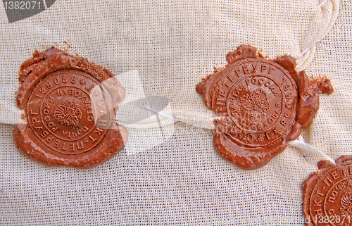 Image of of sealing wax seal on old parcel