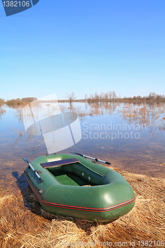 Image of rubber boat on big lake