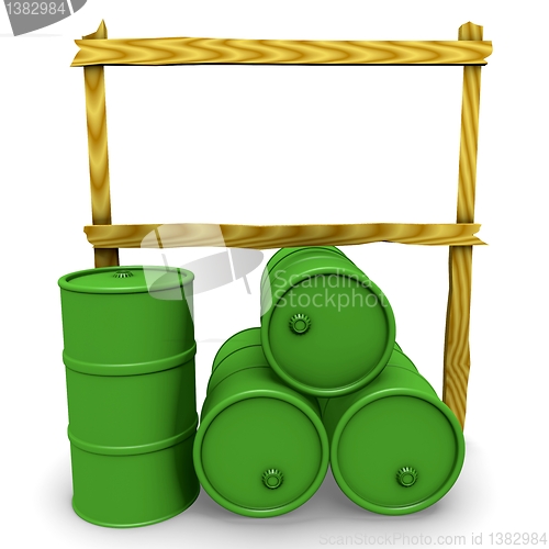 Image of Green barrels with blank billboard