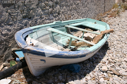 Image of old rowing boat on land