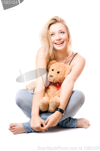 Image of Cheerful blonde with a teddy bear