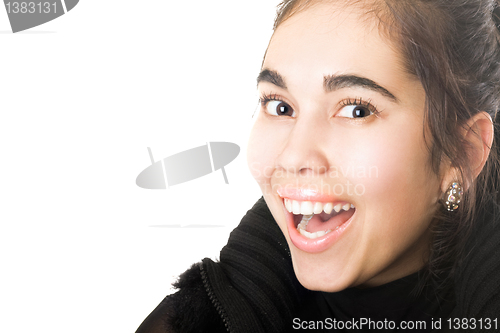 Image of Portrait of smiling young brunette. Isolated