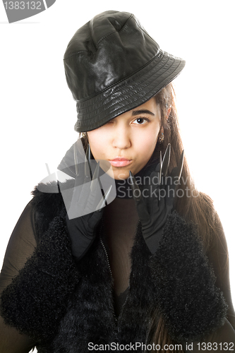 Image of Portrait of attractive young brunette in gloves with claws