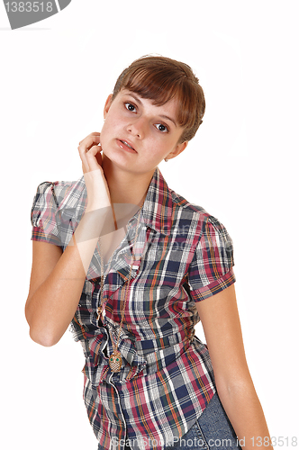 Image of Girl holding her head.