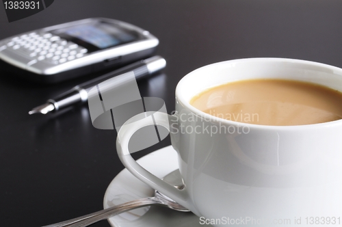 Image of cup of coffee in the office