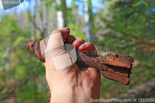 Image of grenade launcher mine in hand