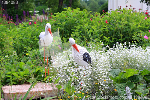 Image of toy crane on town lawn