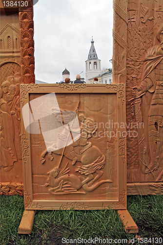 Image of wooden icons on street exhibition