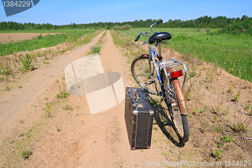 Image of old bicycle on rural road