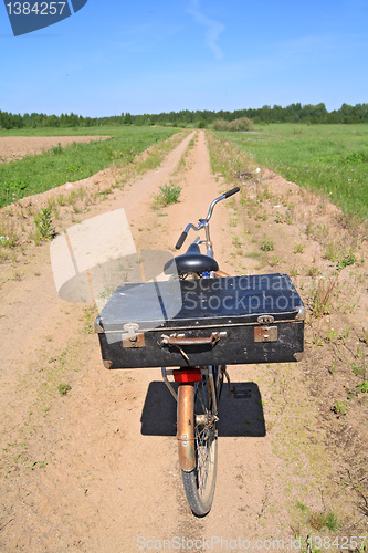 Image of old bicycle on rural road