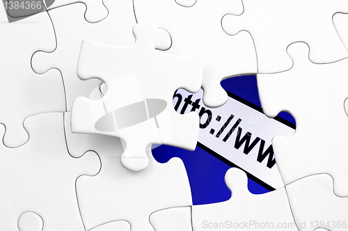 Image of puzzle and www