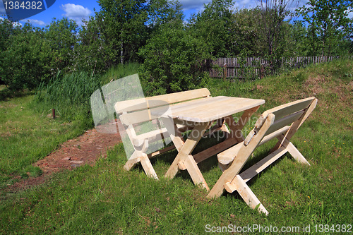 Image of garden furniture near old pond