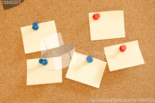 Image of blank sheet of paper on bulletin board