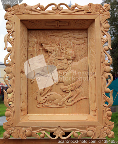 Image of wooden icon on street exhibition