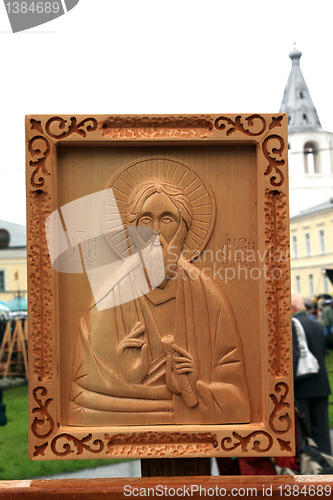 Image of wooden icons on street exhibition