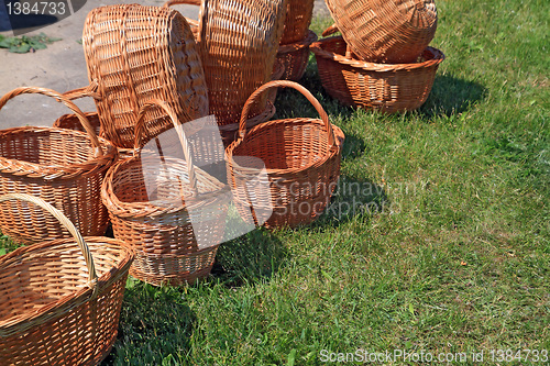 Image of brown baskets on green herb