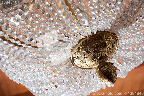 Image of vintage crystal and bronze chandelier