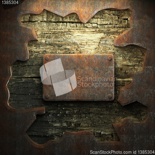 Image of rusty metal and wood plate