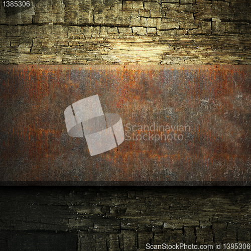 Image of rusty metal and wood plate