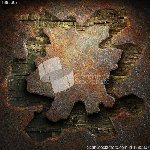 Image of rusty metal and wood plate