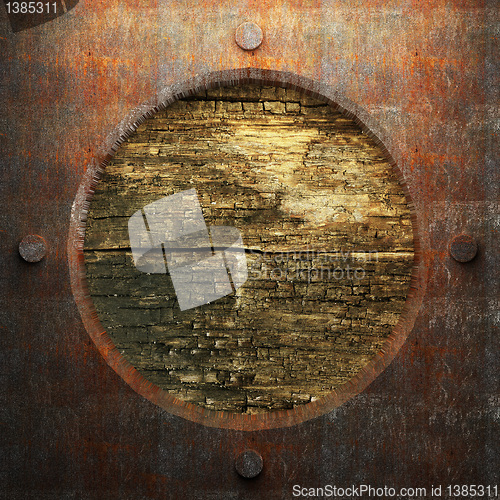 Image of rusty metal and wood plate
