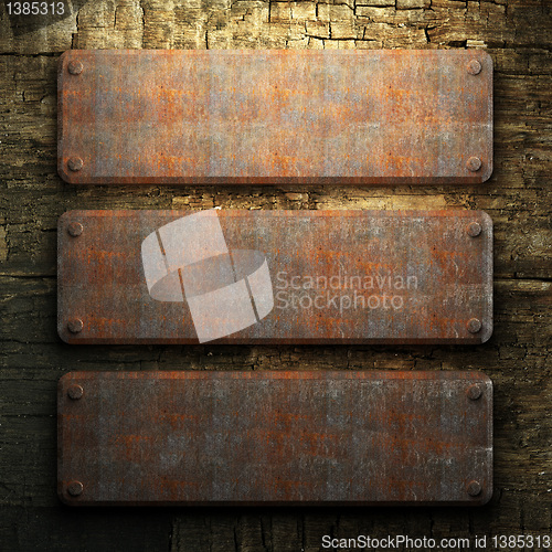 Image of rusty metal and wood plate