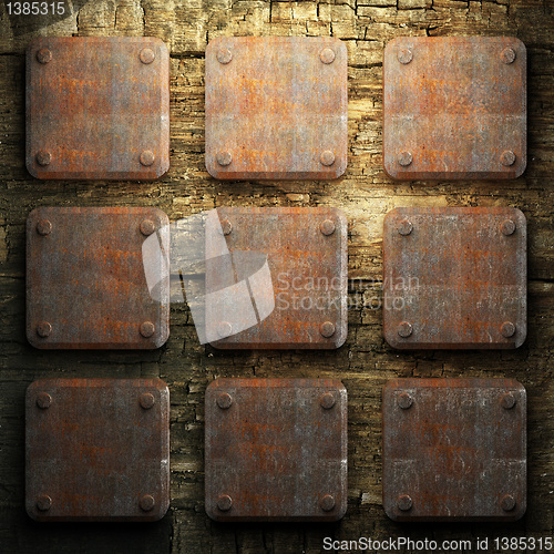 Image of rusty metal and wood plate
