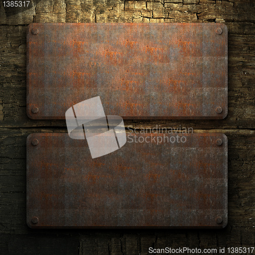 Image of rusty metal and wood plate