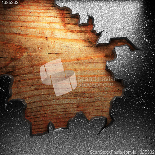 Image of iron plate on wood