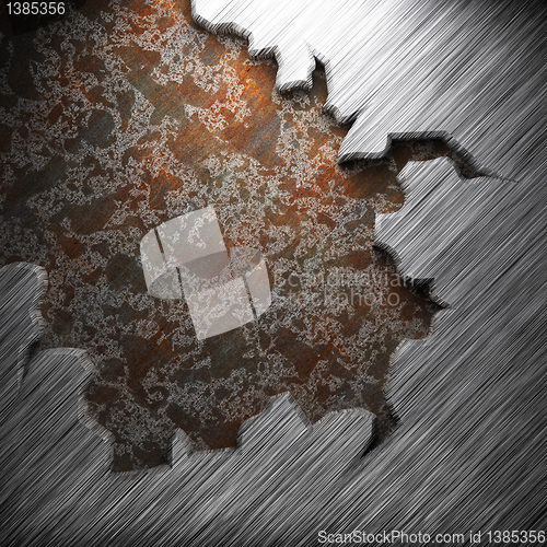 Image of aluminum and rusty metal plate