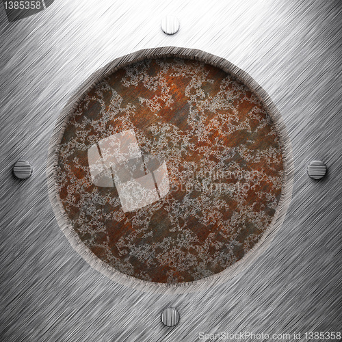 Image of aluminum and rusty metal plate
