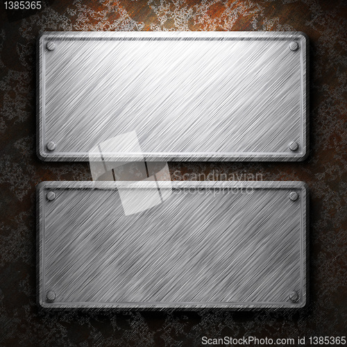 Image of aluminum and rusty metal plate