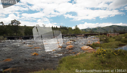 Image of Wooden bridge over river