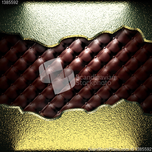 Image of golden plate on leather