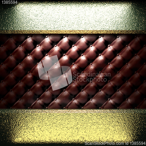 Image of golden plate on leather